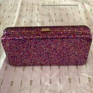 Pink sparkly clutch by Tarte